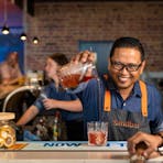 A staff member mixes a delicious cocktail at the Sandbar in Mindil Beach Casino Resort