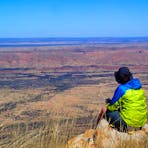 Hiker resting in the Red Centre