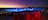 Guests watching Sunrise Journeys laser light show overlooking Uluru and the outback during sunrise