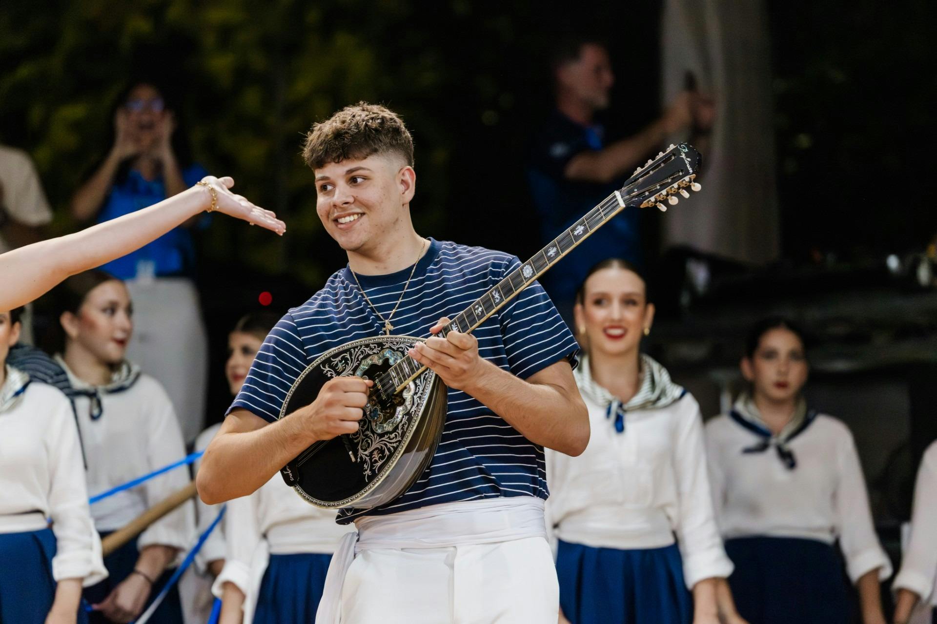 Young man playing the lute