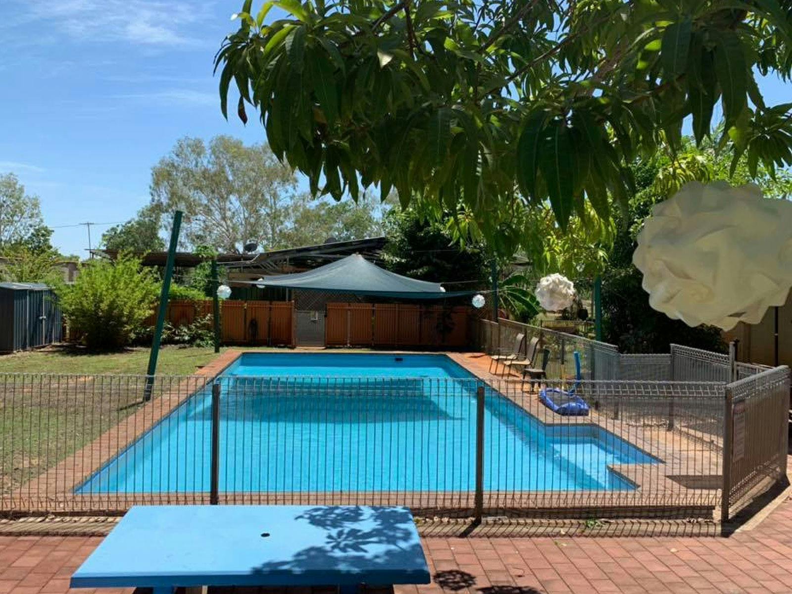 Swimming pool and seating area at the Borroloola Hotel Motel.