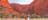 Woman walking the base of Uluru