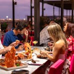 Nothing beats good friends, great seafood, and waterfront sunsets