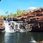 Charter North groups swimming at Bell Gorge waterfalls in The Kimberley               he Kimberley