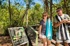 Couple walking together on the Wangi Falls Walk
