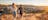 A young couple walking down ANZAC Hill