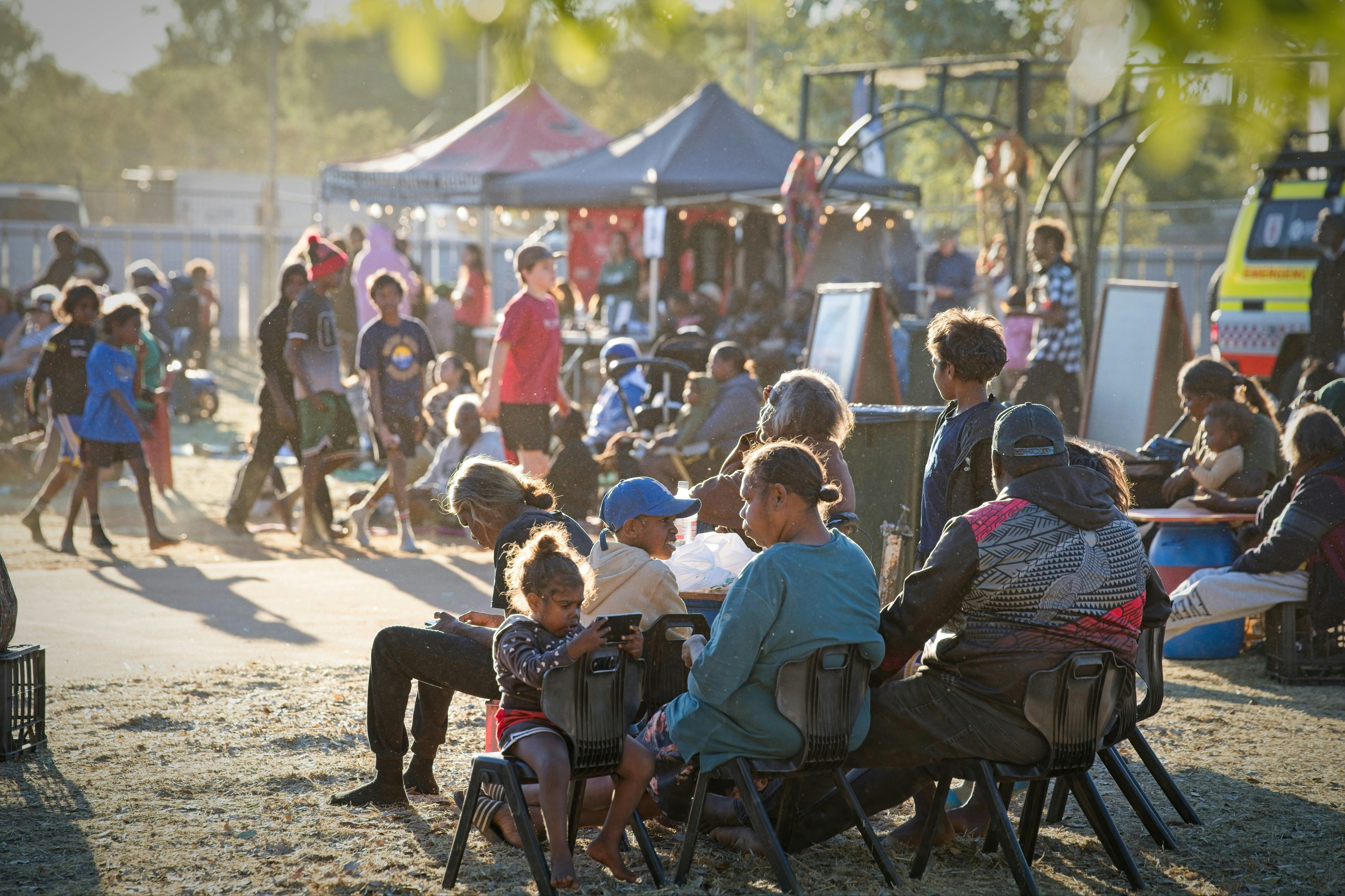 Community members viewing the live performances