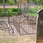 Rudimentary graves at Adelaide River Pioneer Cemetery.