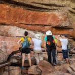 A group viewing rock art at Nourlangie Rock