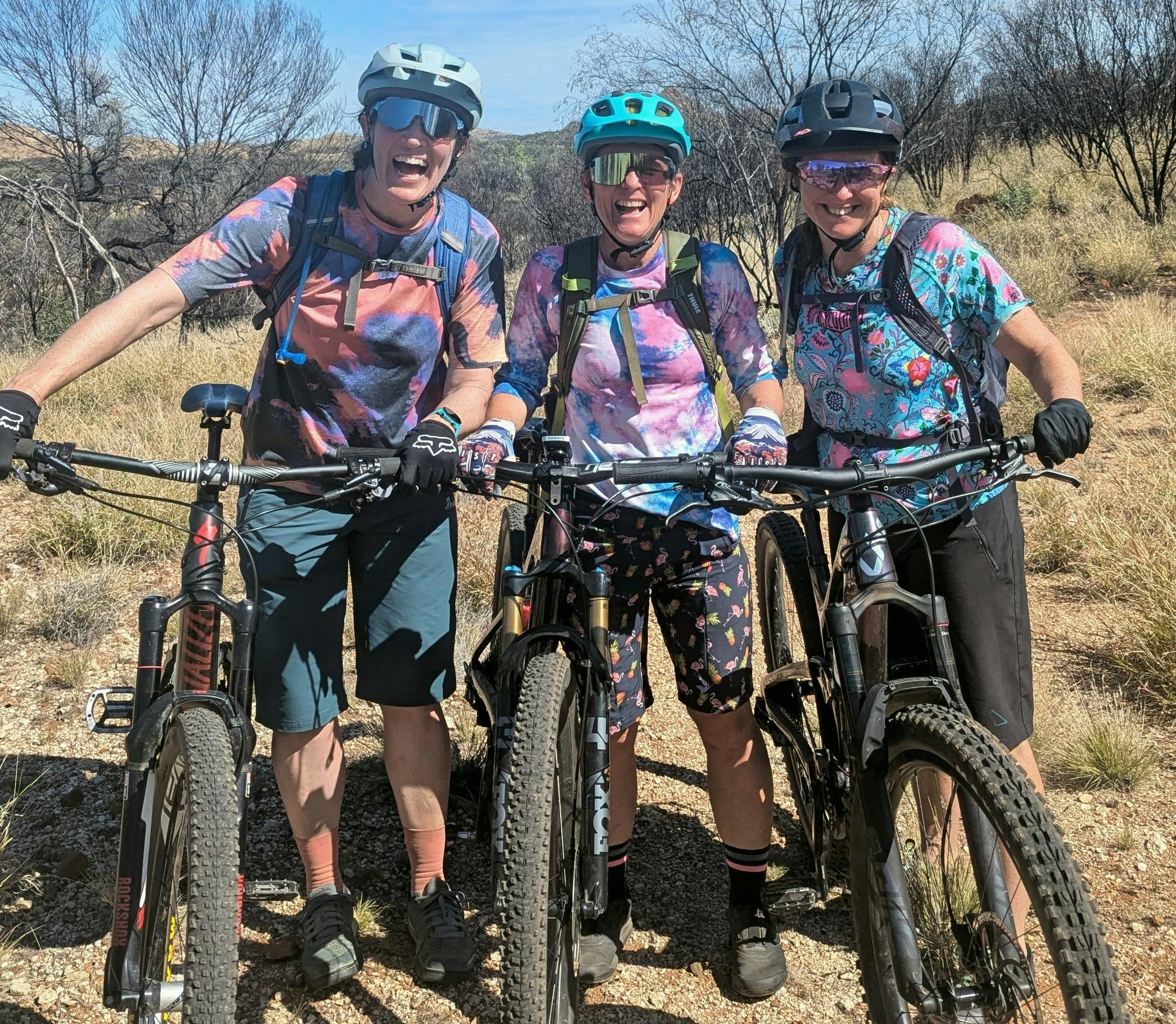 three instructors Shred the Desert supported group womens mountain bike retreat Central Australia