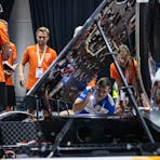 Solar Car being checked by teams