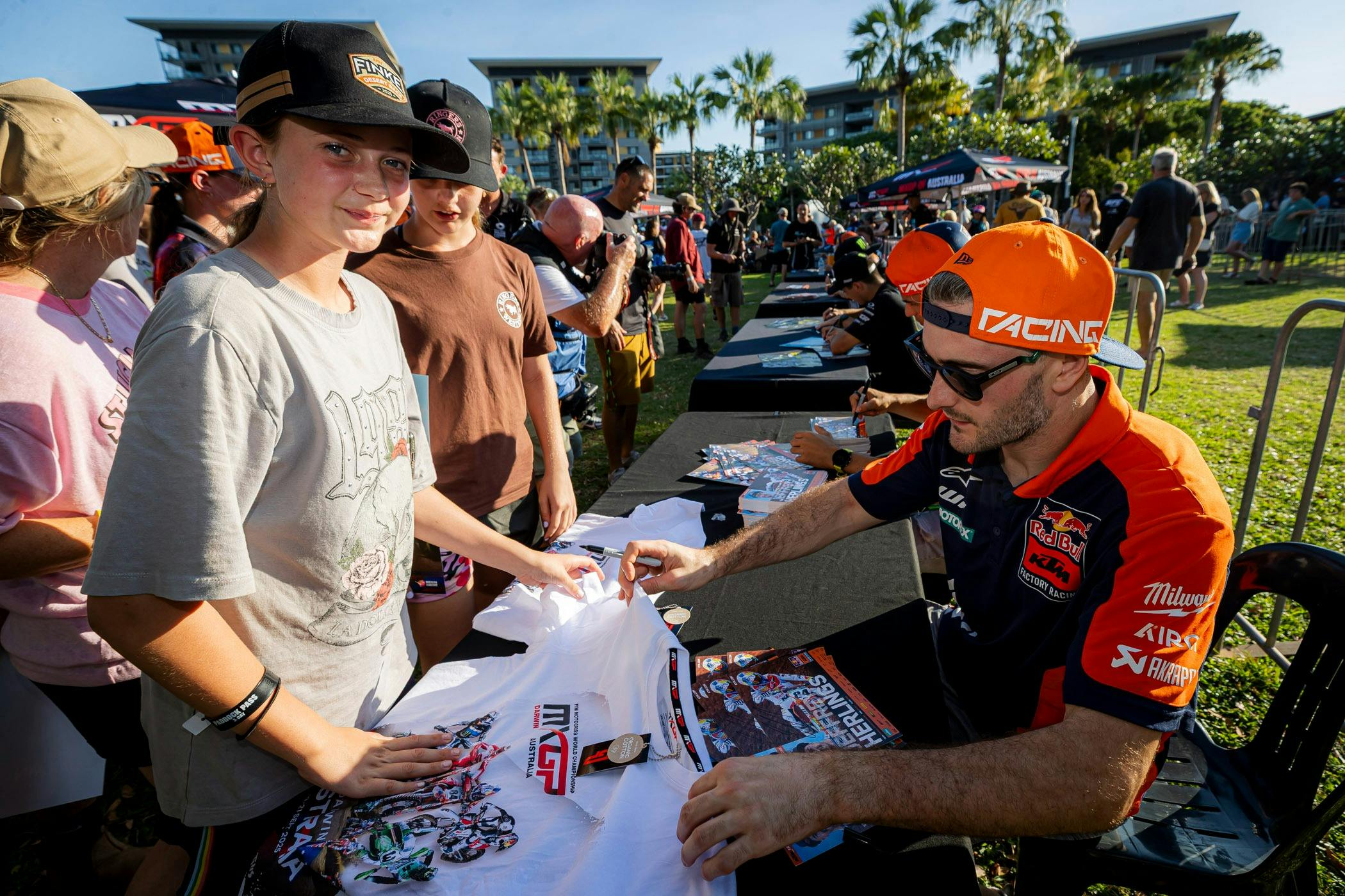 Kids at the riders signing with MXGP riders signing shirts