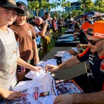 Kids at the riders signing with MXGP riders signing shirts
