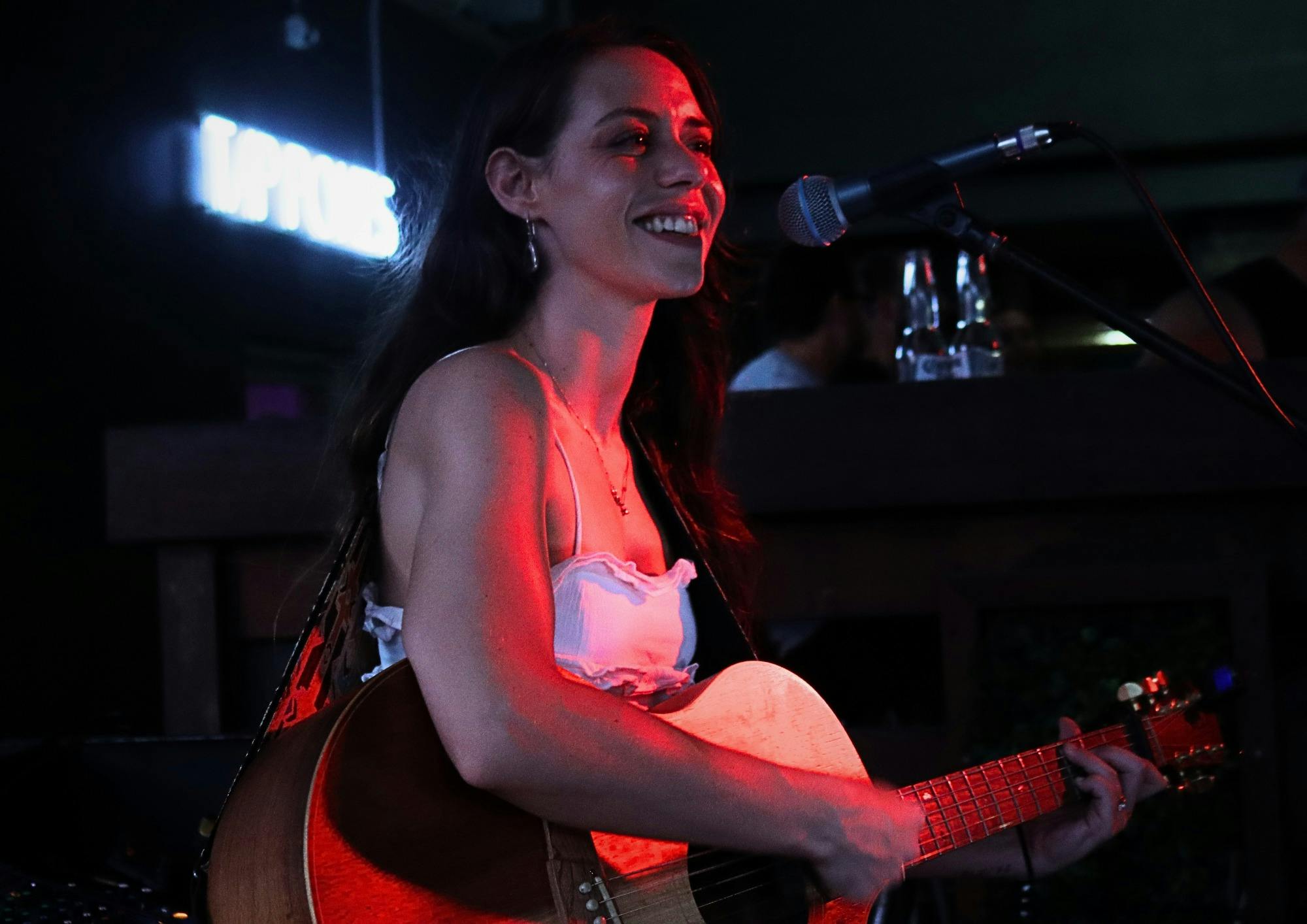 Saysha Ham musician performing. Female guitarist, song writer, solo artist
