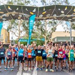 A group of runners at the start line