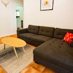Large comfortable lounge in a tastefully decorated living area.