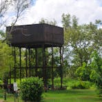 Overhead water tank behind the station.