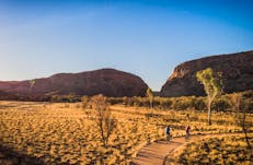 Visitors riding on Simpsons Gap bike path towards Simpsons Gap