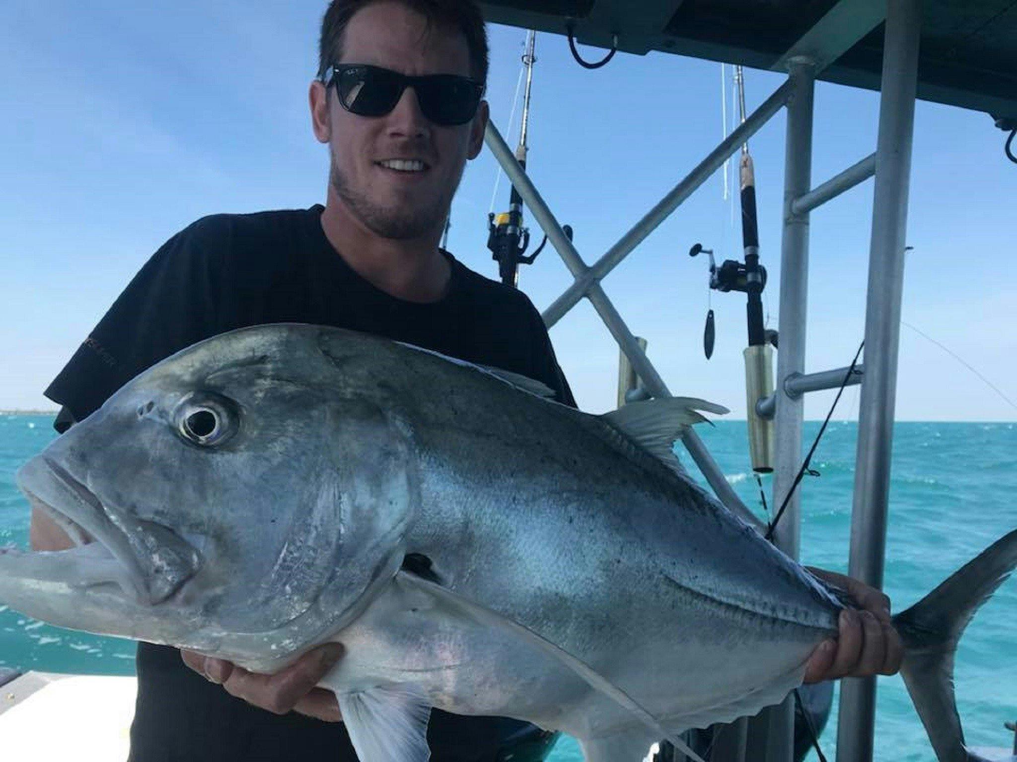 A man holding a GT at Offshore Boats