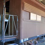 Timber-clad carriage.
