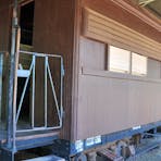Timber-clad carriage.