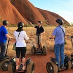 See Uluru's entire massive base on an Uluru Sunrise and Segway Tour.