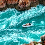 Zodiac Carrying Guests Through Horizontal Falls