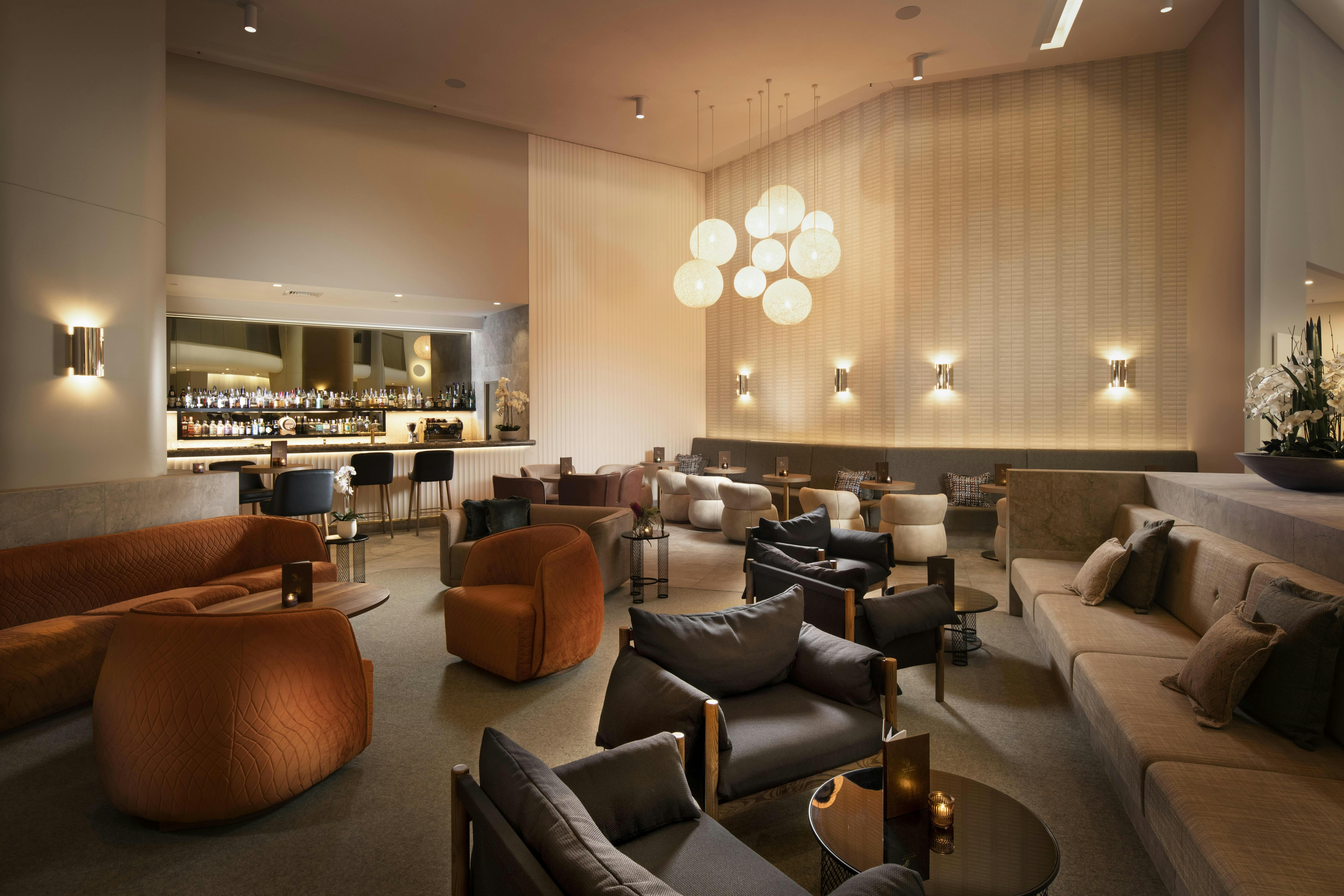 Brown mood lighting, cocktails at Palm Court Bar and Lounge in mitchell street in darwin