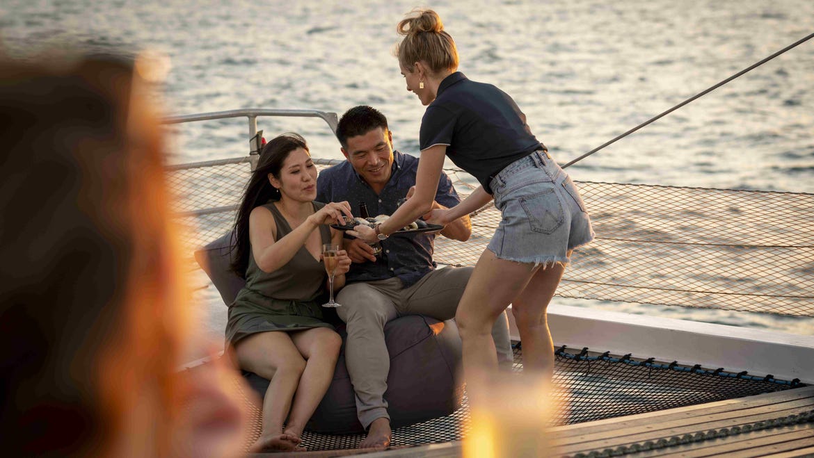 Drinks and nibbles being served on a cruise with Sail Darwin