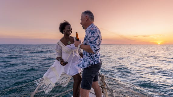 Couple enjoying the sunset with Sail Darwin