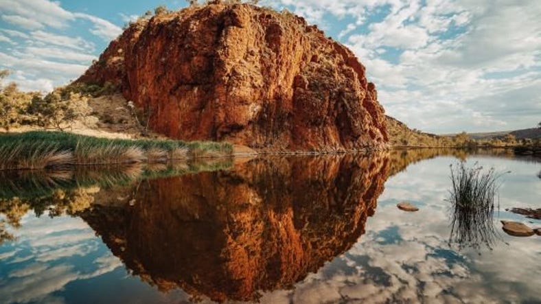 Water reflection at Glen Helen waterhole.jpg
