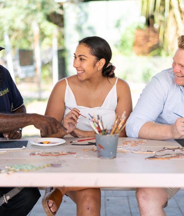A couple at an Aboriginal art workshop in the Top End