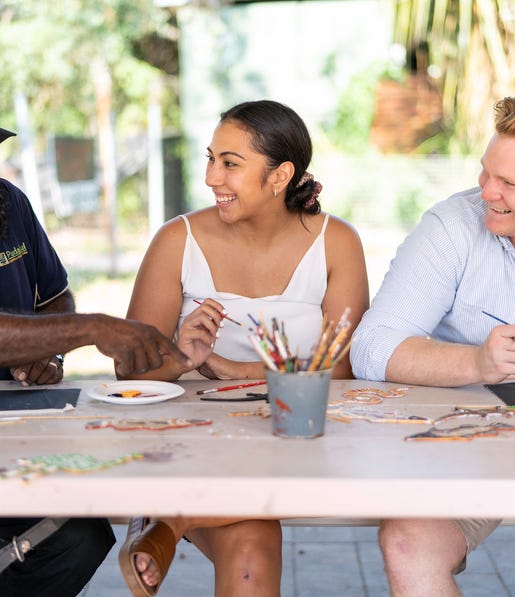 A couple at an Aboriginal art workshop in the Top End