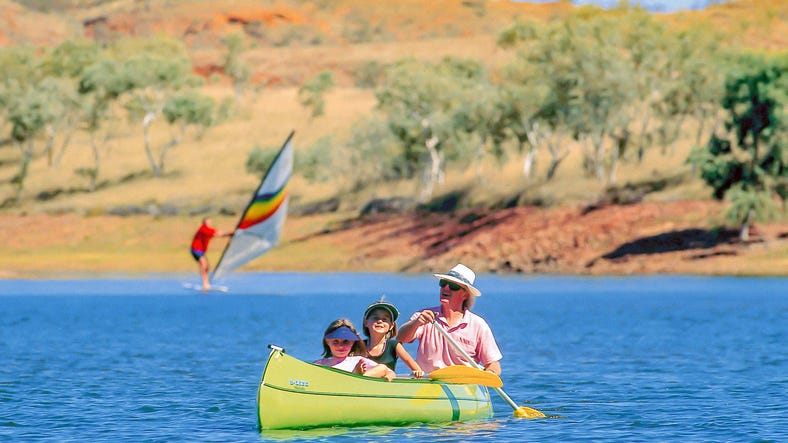Family kayaking on Lake Maryann near Tennant Creek