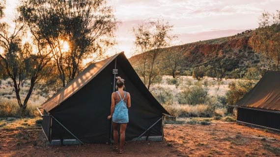 girl in front of her tent camping at glen helen.jpg