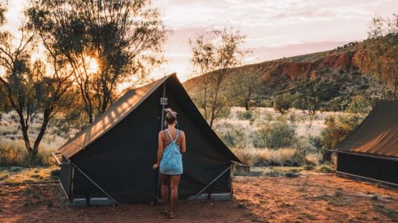 girl in front of her tent camping at glen helen.jpg