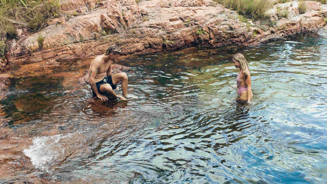 Friends swimming at Buley Rockhole in Litchfield National Park
