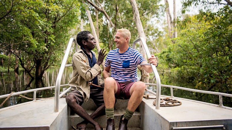 Two people on a boat chatting