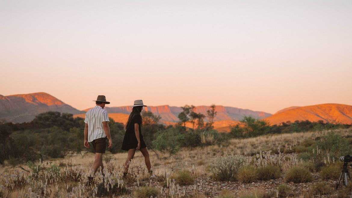 a young couple at mount sonder lookout at dusk
