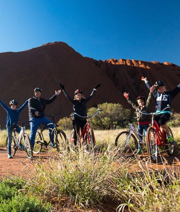 Matt Hayden and family cycling at Uluru