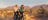 a couple outback cycling in Uluru