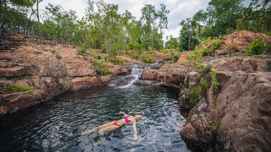 Woman Floating at Bluey Rockhole