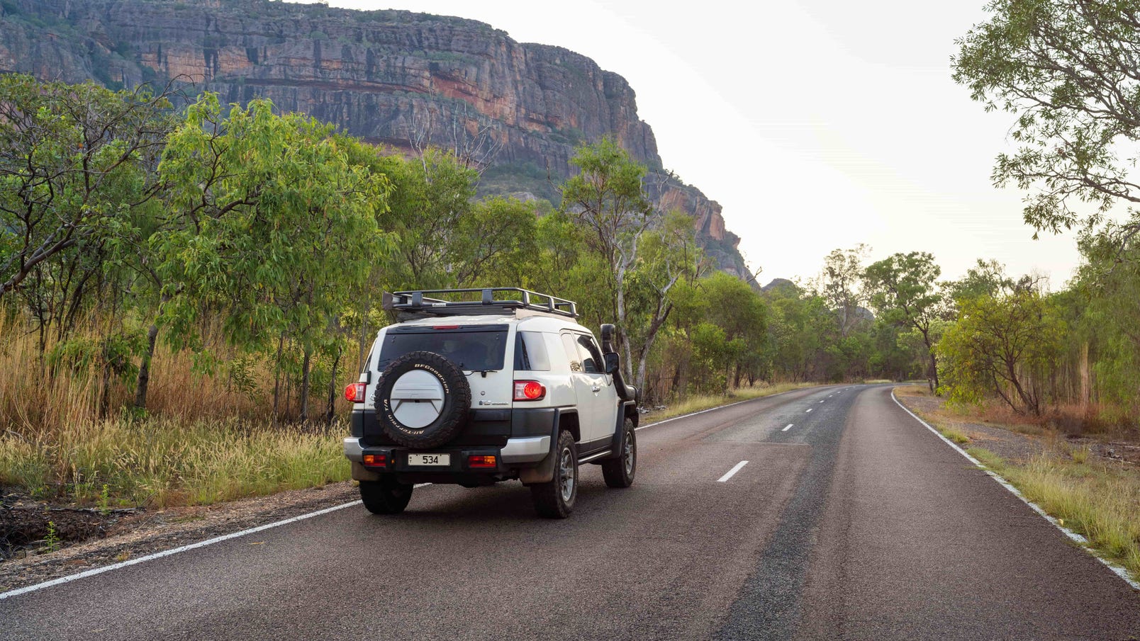 138528-35 driving in Kakadu