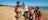 Visitor experiences a Aboriginal dancing on the beach.