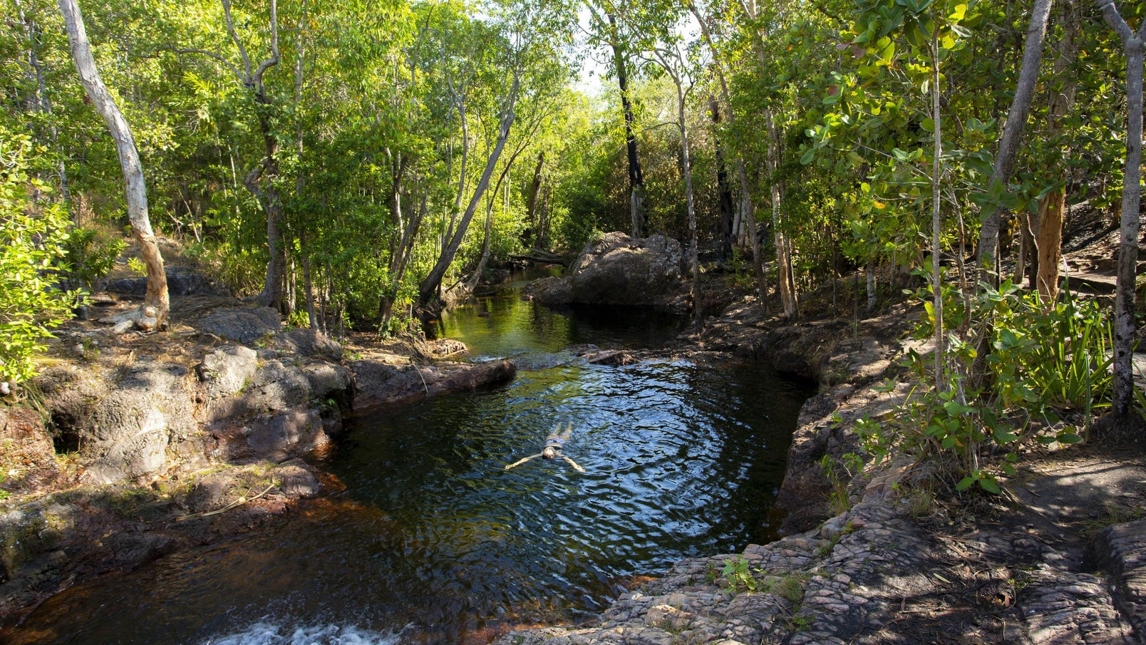 Woman swimming at Buley Rockhole