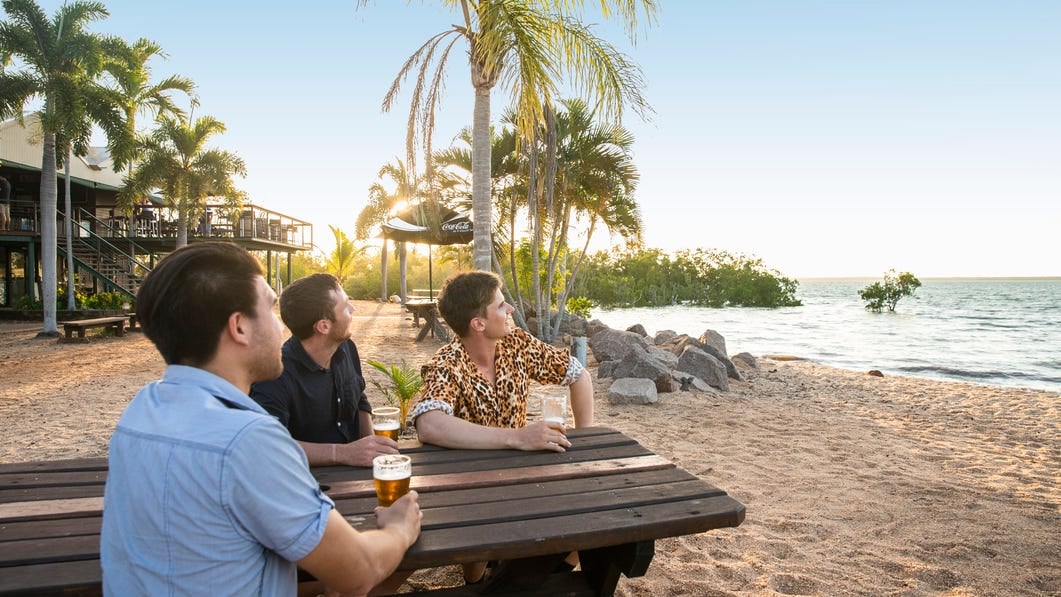 Friends having a beer at Crab Claw Island