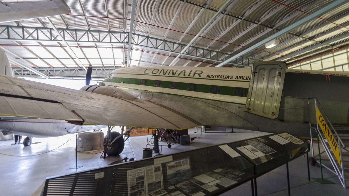 Connair airplane parked in the hangar of the Central Australian Aviation Museum