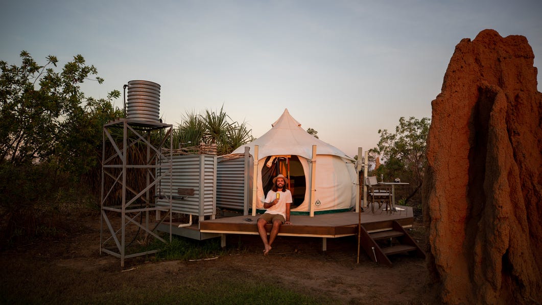 Man unwinding at the Top end Safari camp