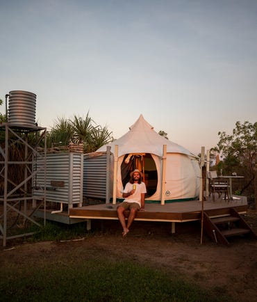 Man unwinding at the Top end Safari camp