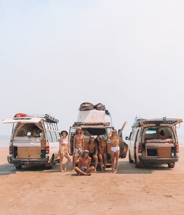 Group of friends parked up at the beach at Gunn Point